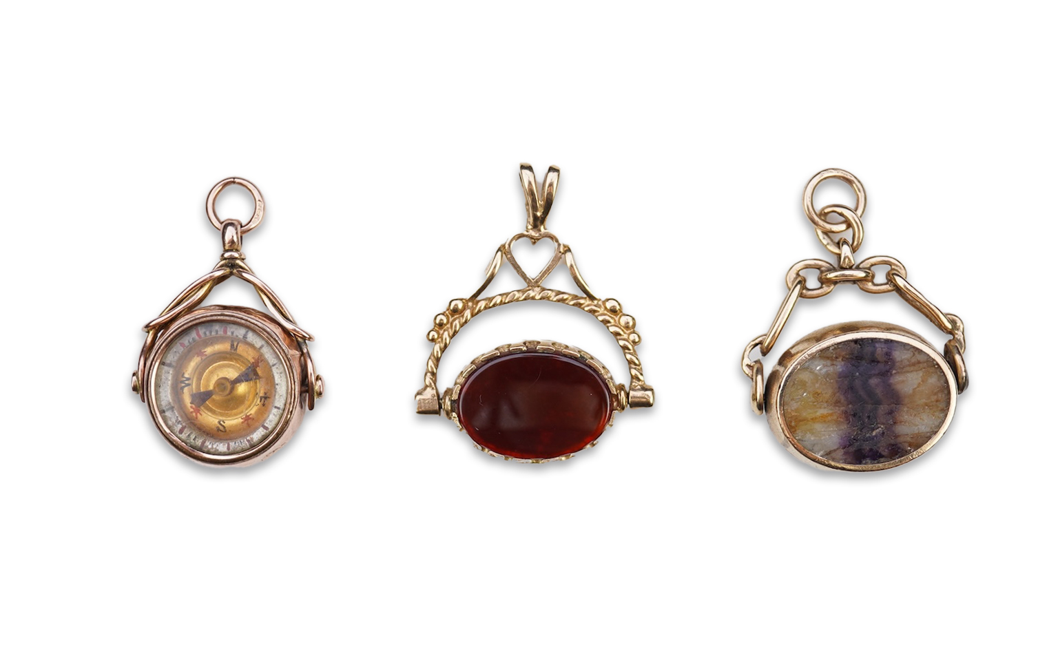 Three 9ct gold fob pendants